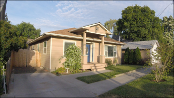 Front of Beige House.