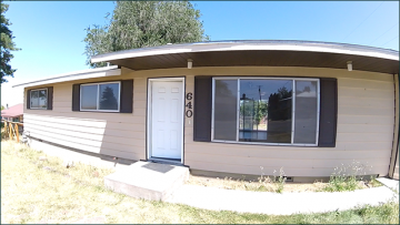 Frontyard of beige house